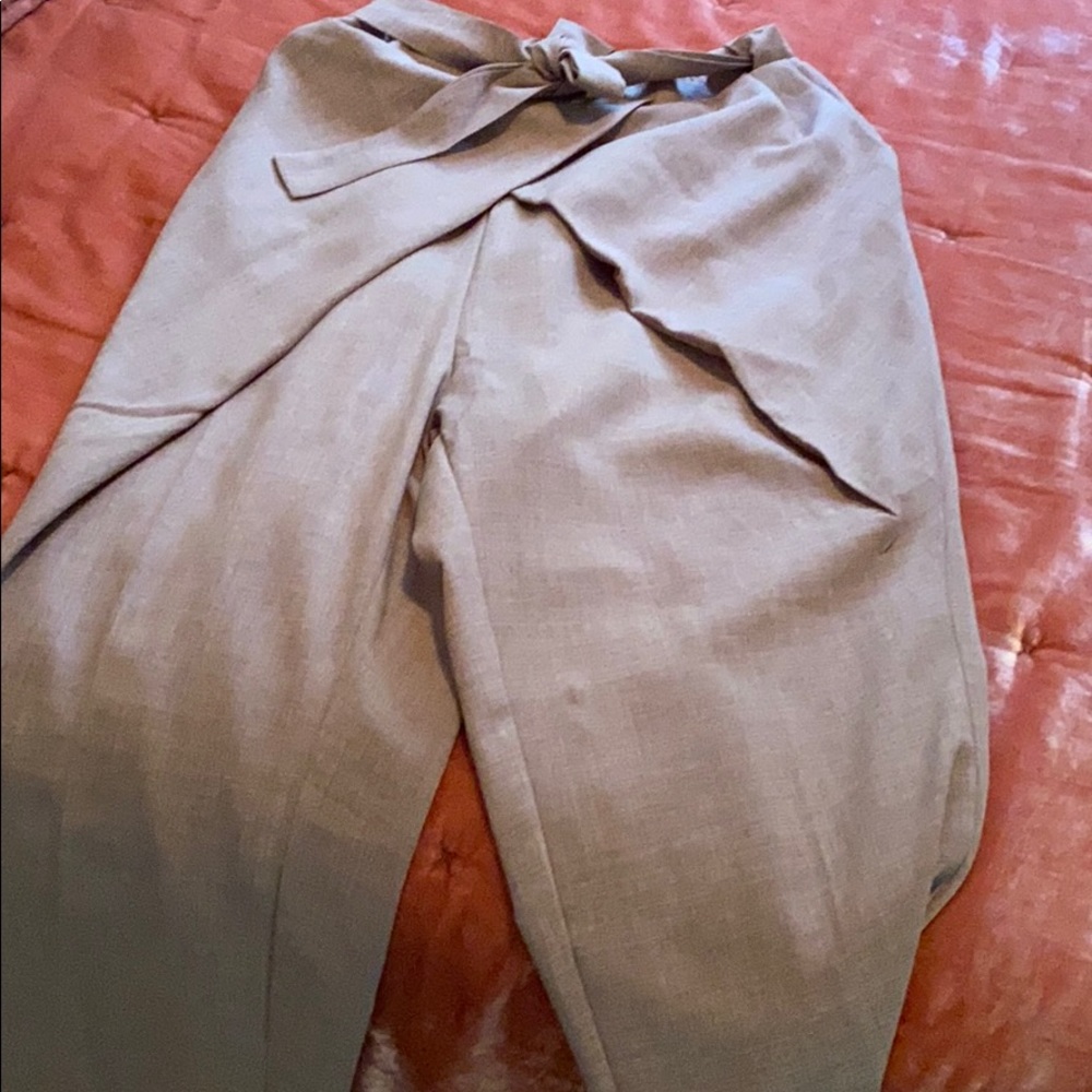 Cross front high waisted slacks with pockets.